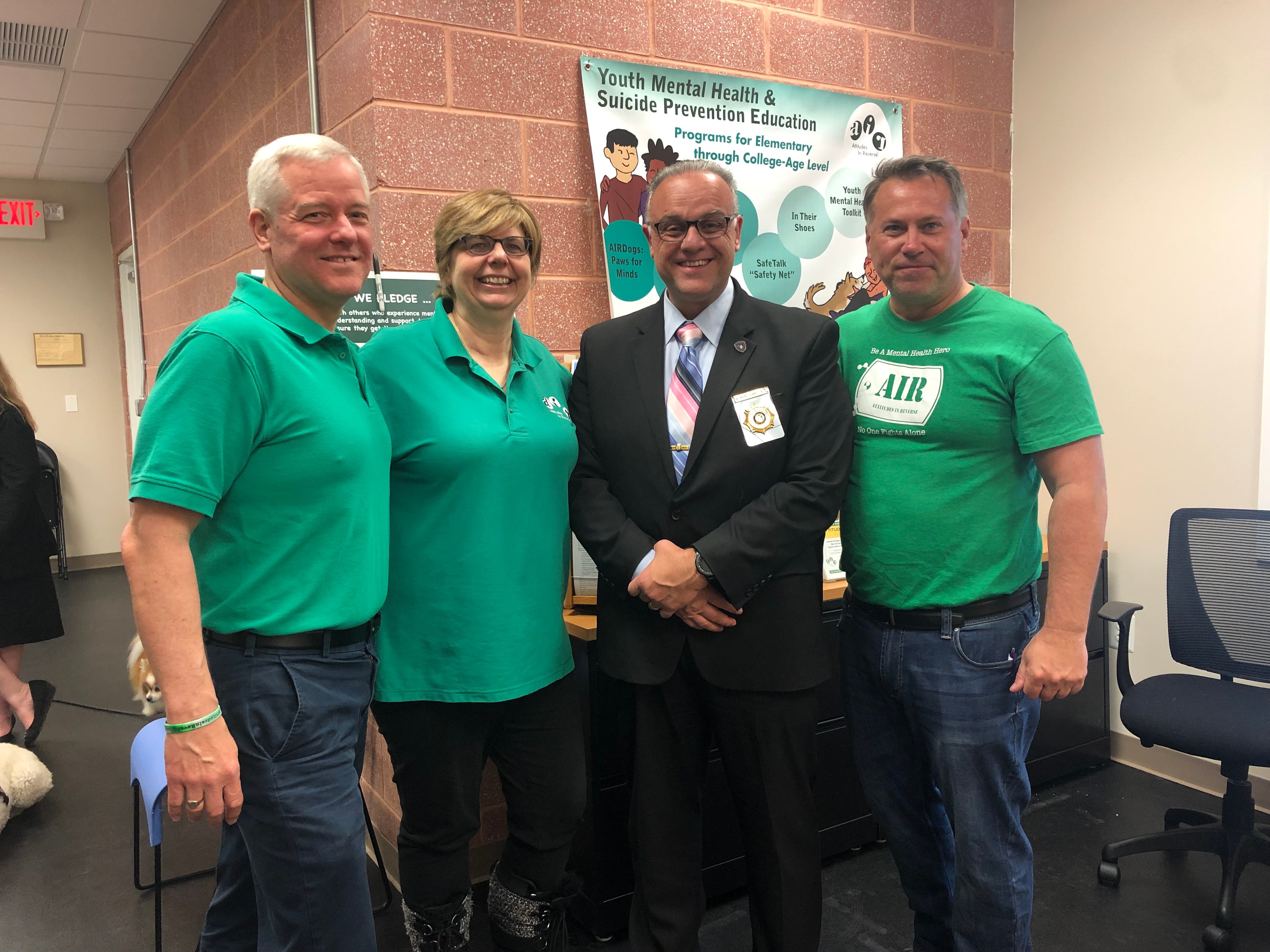 Kurt, Tricia and police at ribbon cutting